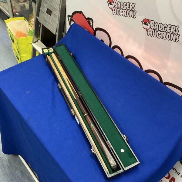 CC snooker cue in a protective case, ready for play.