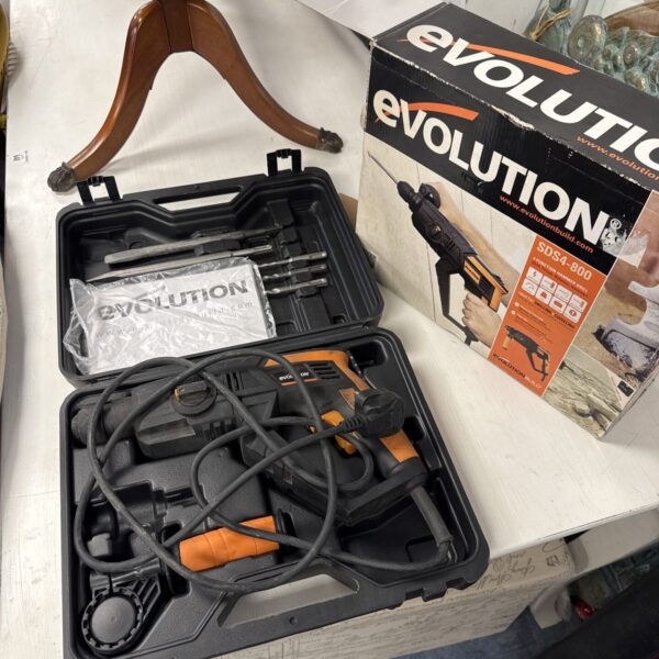Evolution SDS-800 hammer drill set in carrying case.