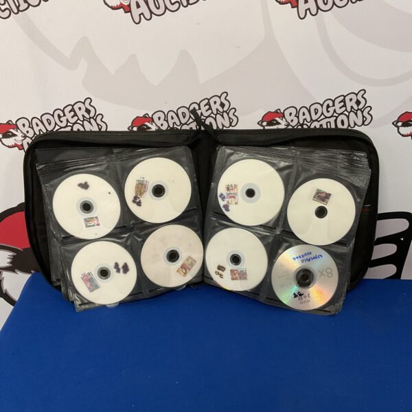 A lot of copied adult DVDs presented for auction.