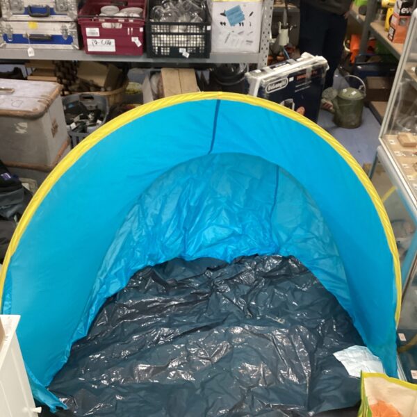 Used Halfords baby beach shelter, providing sun shade for children.