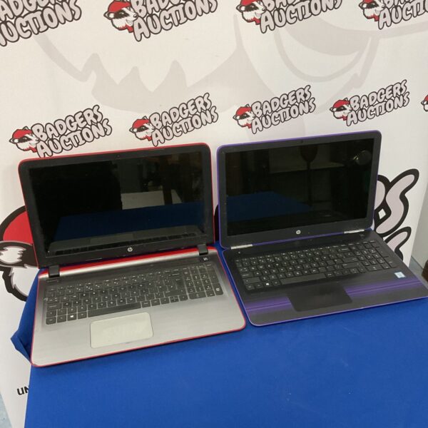 Two HP Pavilion laptops presented as a lot for auction.
