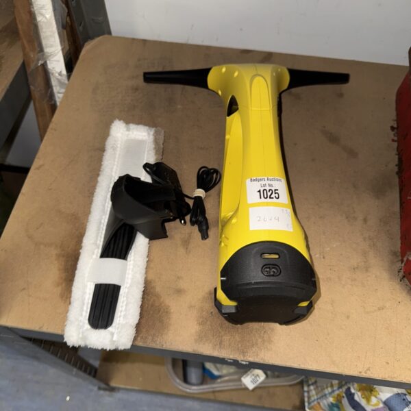 Karcher WV50 window vacuum cleaner with charger and accessories.