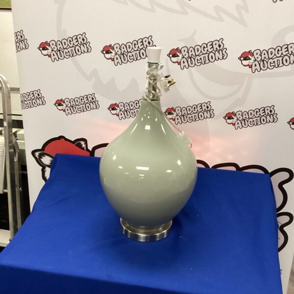Vintage balloon table lamp with chrome base and frosted shade.