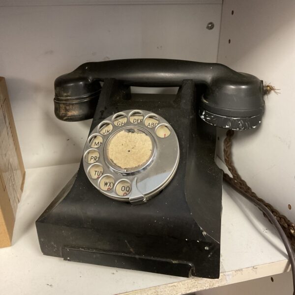 Vintage 1940s bakelite rotary telephone for collectors.