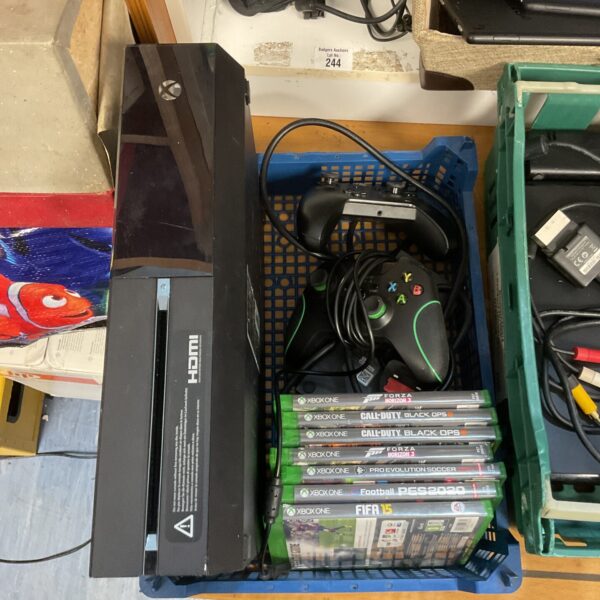 Xbox One console bundle with games and controller presented.