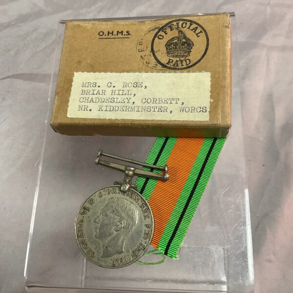 WWII British Defence Medal in its original box, named to Mrs. Rose.