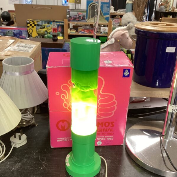 Original Mathmos lava lamp with its original box, a vintage collectible.