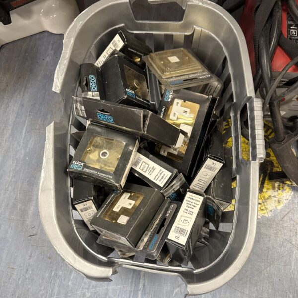 Quantity of brass effect sockets and switches in a mixed lot.