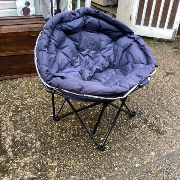 Padded folding camping chair for outdoor use and festivals.