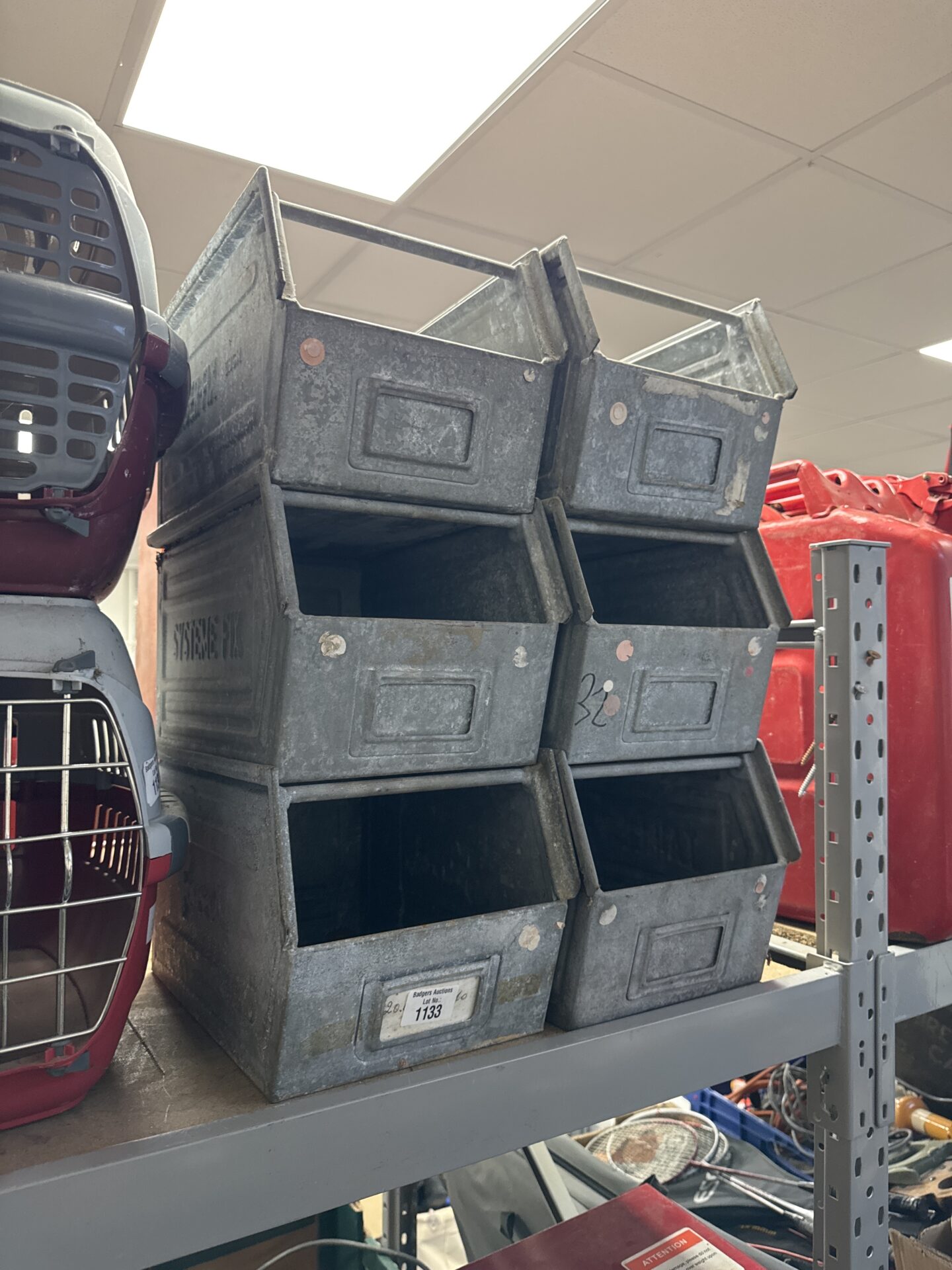 1133 Six large schafer metal storage trays