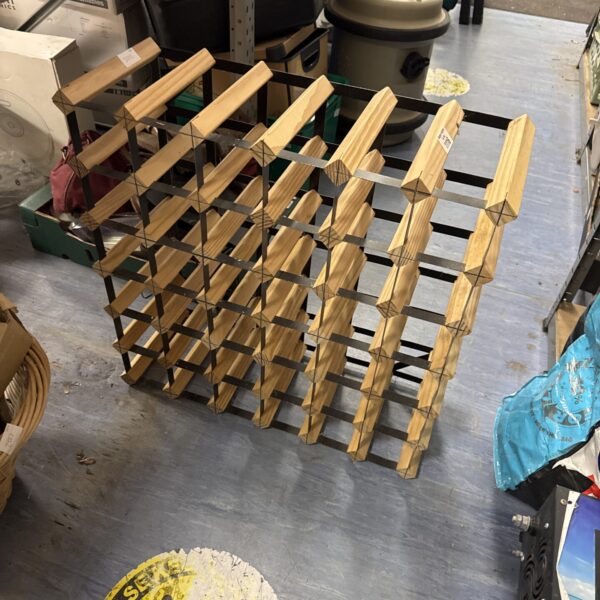 Wooden 36 bottle wine rack for home storage and display.