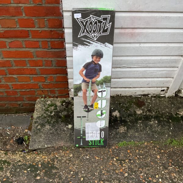 Blue Xootz pogo stick for children's outdoor play.