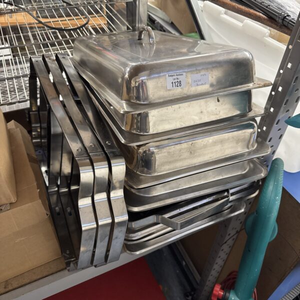 Bundle of stainless steel catering hot food trays for buffet service.