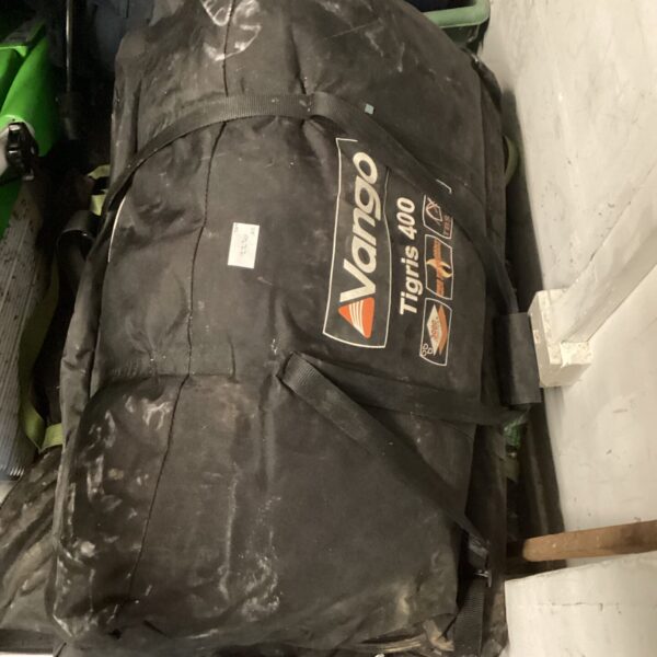 Two Vango tents in their carry bags, ready for camping.