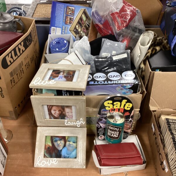 Mixed house clearance lot with various household items and garden trellis.