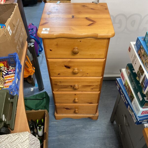 Vintage pine chest of drawers with five drawers.