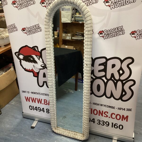 Full length mirror with woven frame, vintage style.