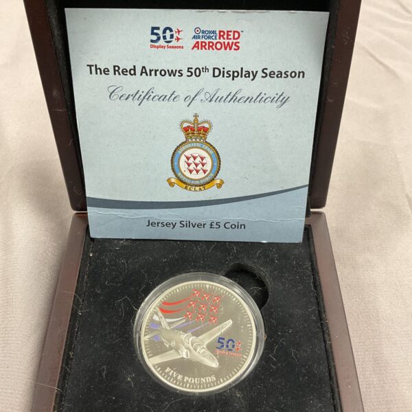 Red Arrows 50th Display Season coin in original packaging.