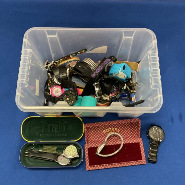 Assorted vintage wristwatches in a storage box, a collector's lot.