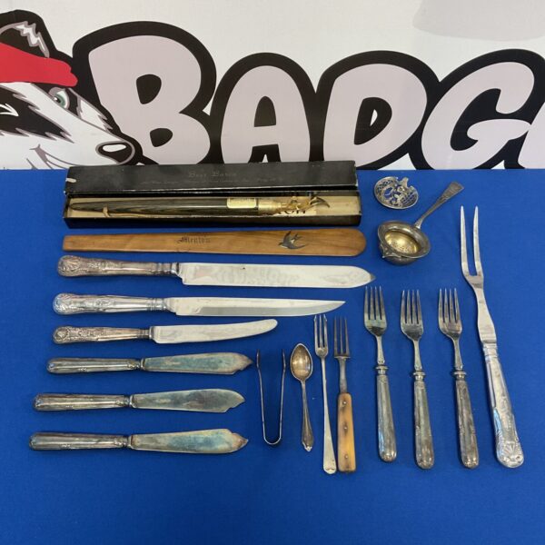 Vintage silver plate cutlery set with carving knife and beer opener.