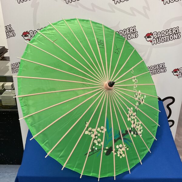 Vintage green silk Chinese parasol, antique Asian umbrella.