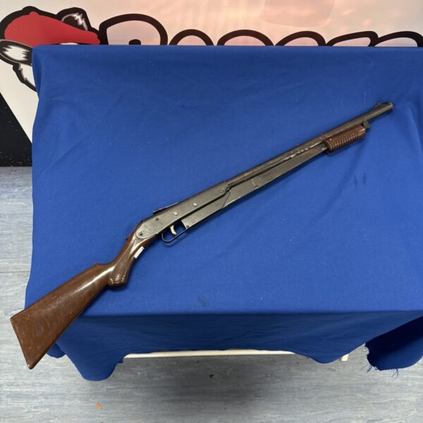 Vintage Daisy Model 25 BB gun with wooden stock.