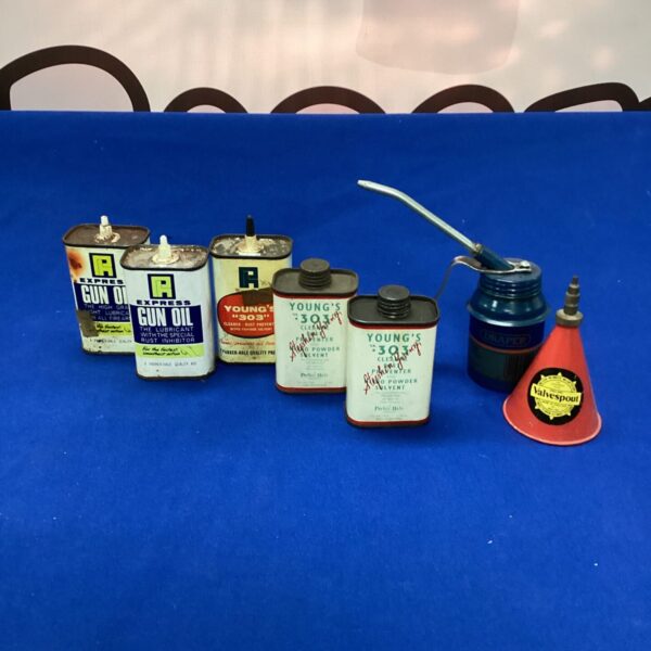 Vintage gun oil and lubricant tins, including Express and Young’s 303.
