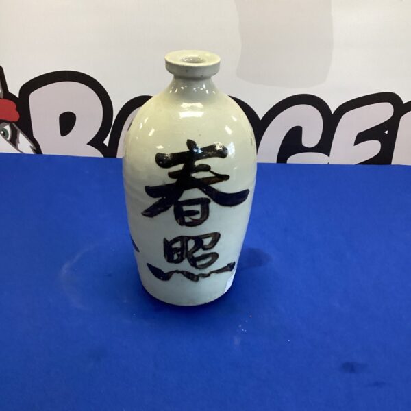 Antique Chinese glazed pottery vase with a glossy finish.