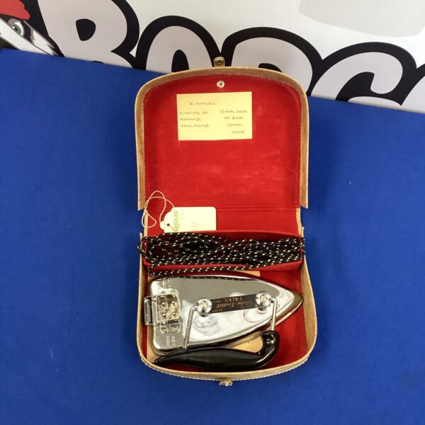 Vintage Falks Globe Trotter travel iron in original case.