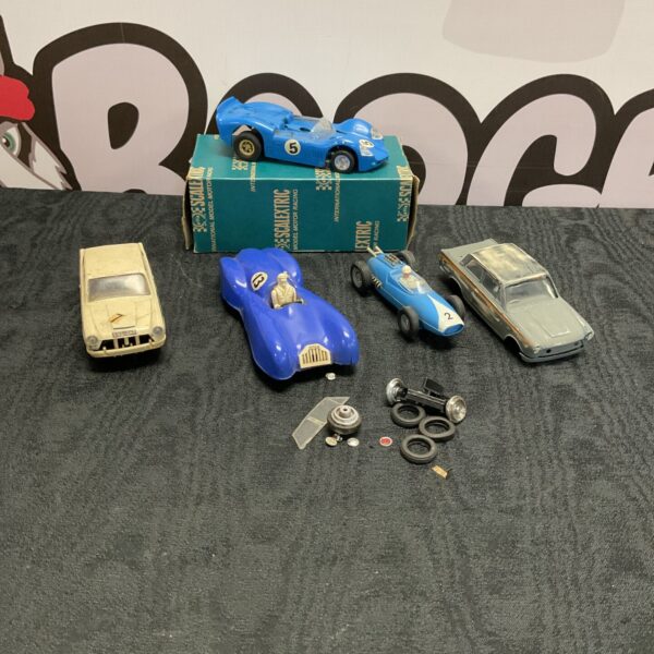 Vintage Scalextric racing cars and parts in a mixed lot.