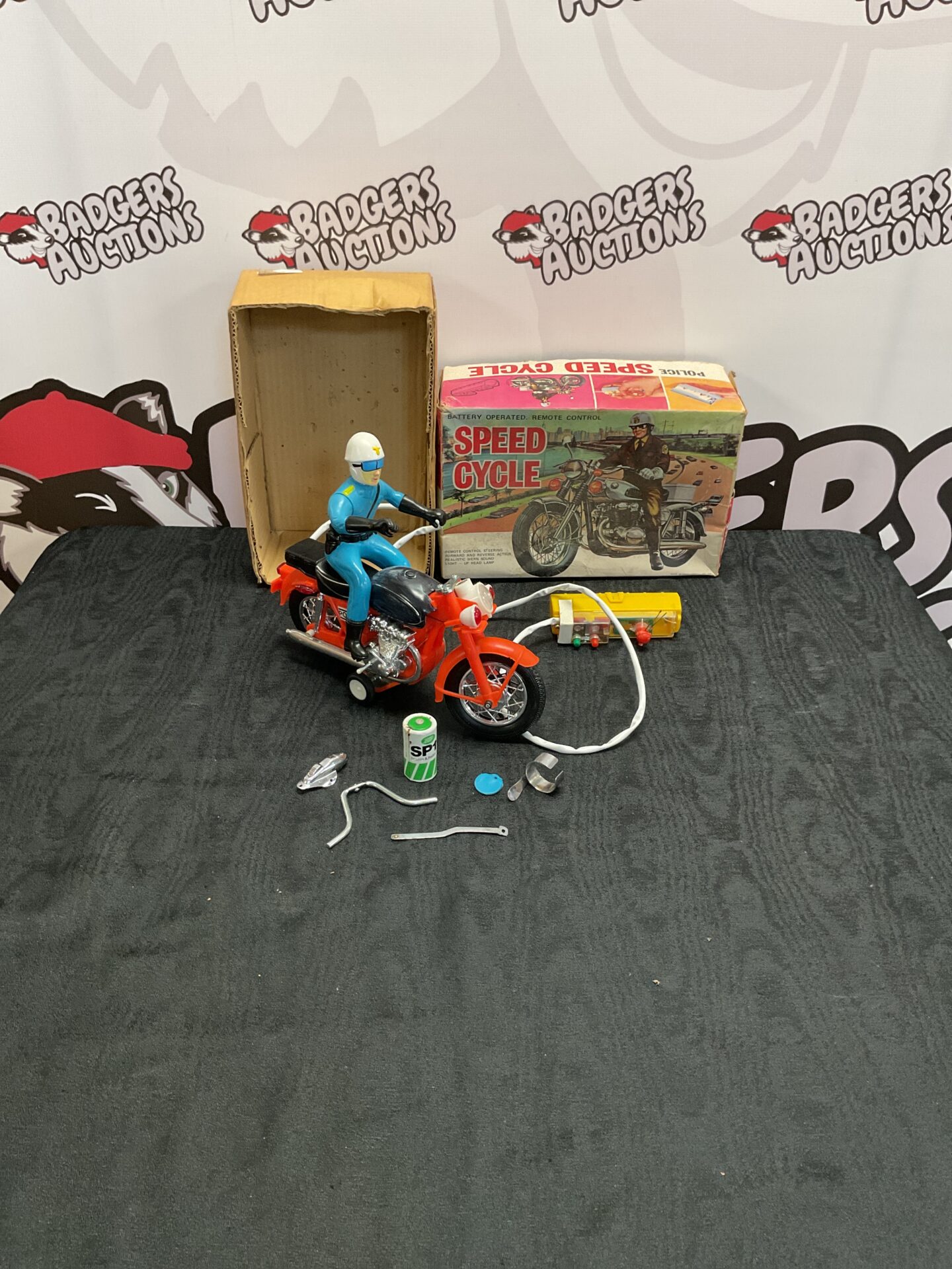 436 Vintage boxed battery operated, remote controlled police speed cycle