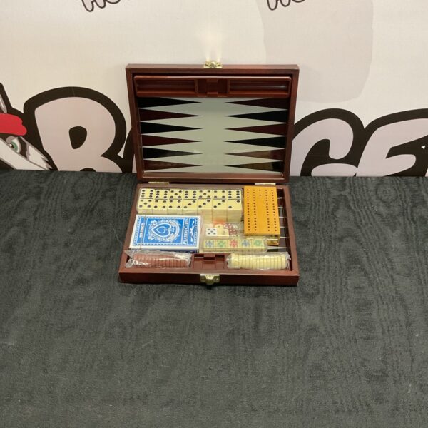 Open vintage leather games compendium with chess and backgammon boards.