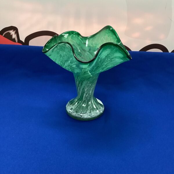 Vintage green glass vase with a splash design.