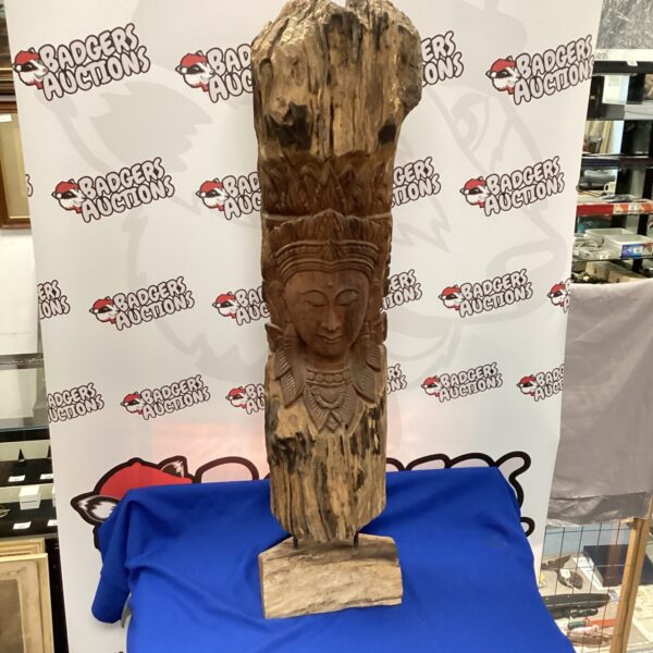 Vintage Lanna teak sculpture with intricate carvings.