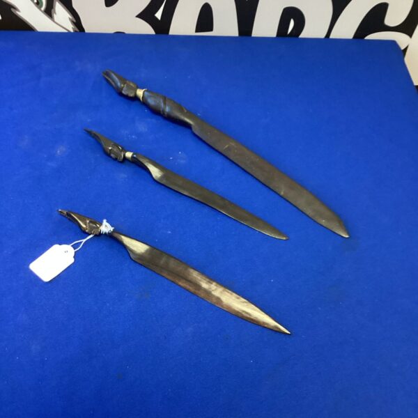 Lot of three hand-carved ebony tribal paper knives.