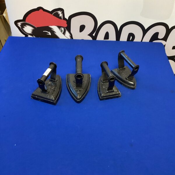 Antique cast iron flat irons, including HK&S London, for collectors.
