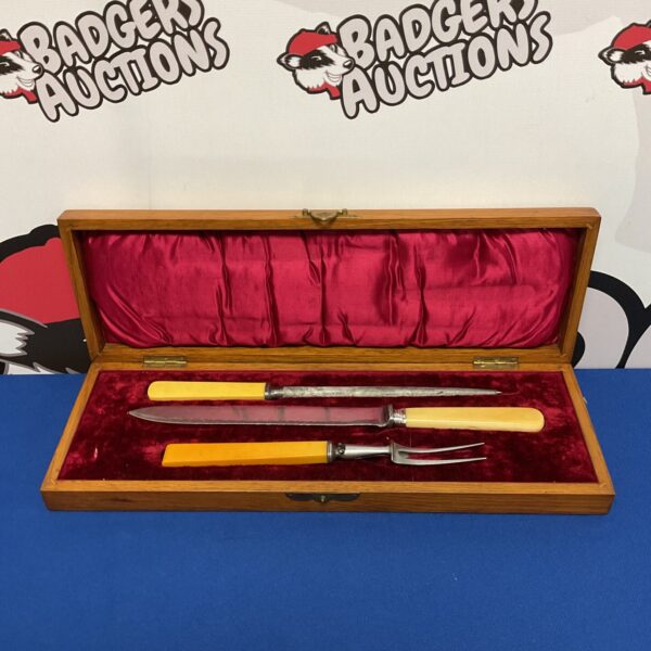 Vintage Humphreys carving set with silver plate and ivory handles.