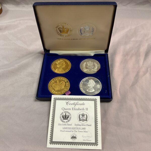 Queen Elizabeth II Golden Jubilee crown set in presentation case.