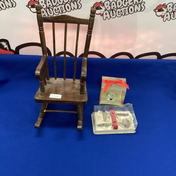 Vintage dolls rocking chair with teddy bear and silverplate set.