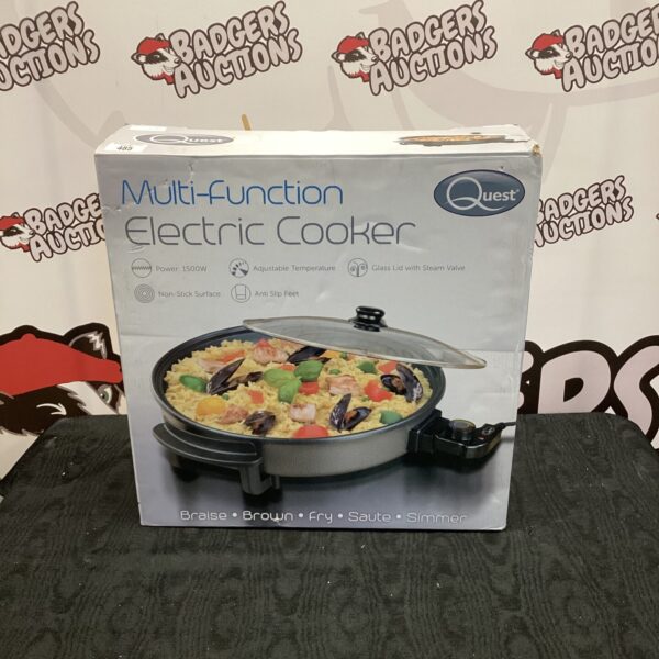 New Quest electric cooker in original packaging.