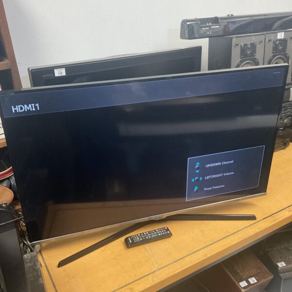 Samsung 40 inch HD television with remote control.