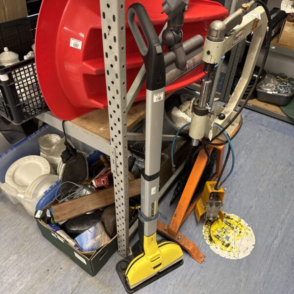 Karcher FC5 hard floor polisher with charger and cradle.