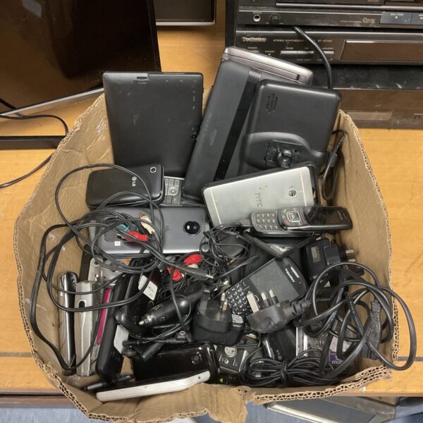 Mixed lot of used mobile phones and tablets including Amazon devices.