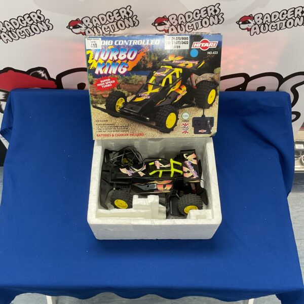 Vintage Hitari Turbo King RC buggy in used condition.