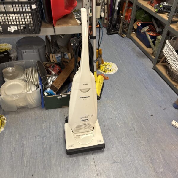 Used Panasonic MC-E3002 cylinder vacuum cleaner for home cleaning.