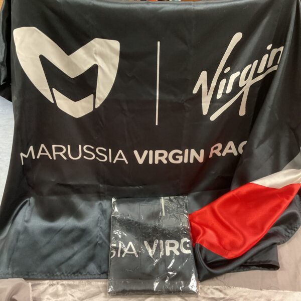 Two Marussia Virgin Racing F1 flags displayed against a neutral background.