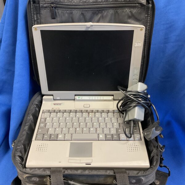 Vintage Videal laptop with charger, a collectible retro computer.