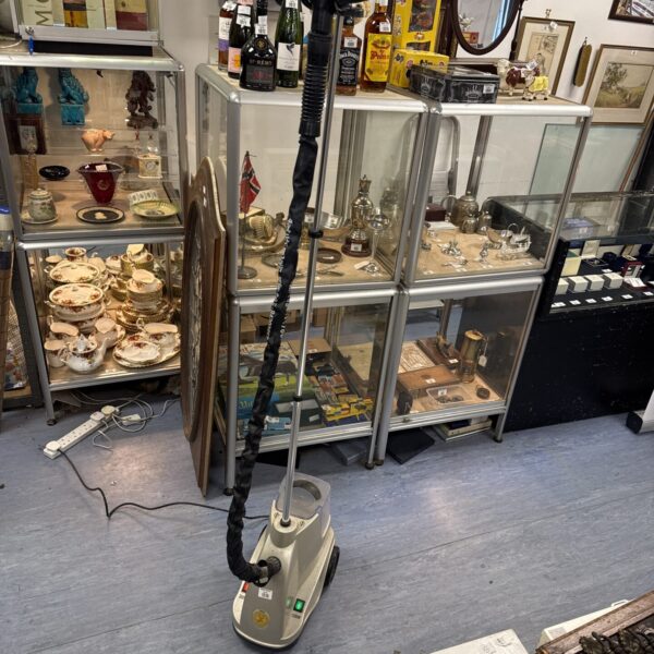 Vintage Tras t2000 steam cleaner with flexible hose and tank.