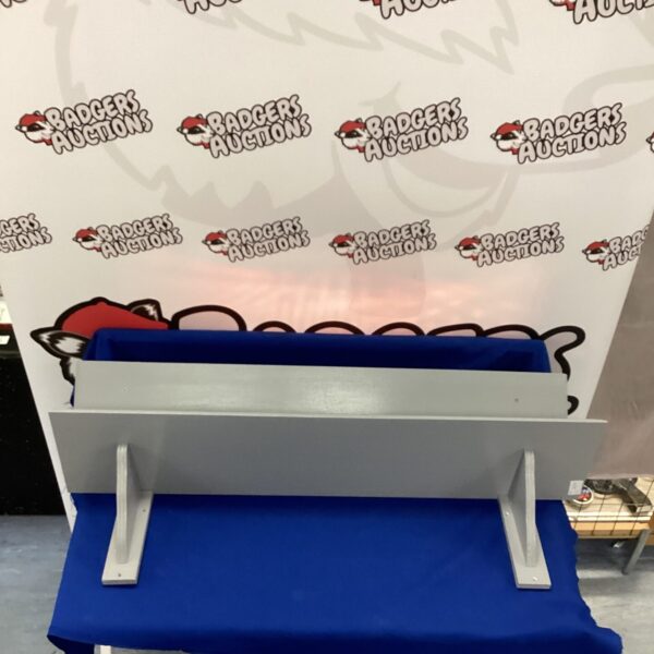 Pair of blue painted wooden shelves for home storage.