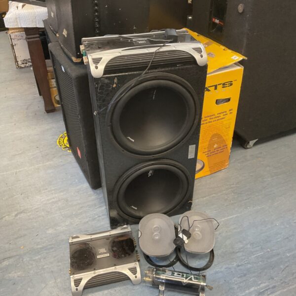 Black Vibe car subwoofer system with amplifiers and speakers.
